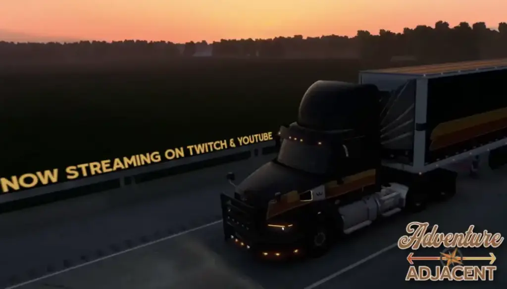 Western Star with box trailer at sunset on highway, marker lights glowing. From the Live Streams.