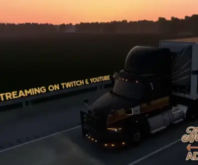 Western Star with box trailer at sunset on highway, marker lights glowing. From the Live Streams.