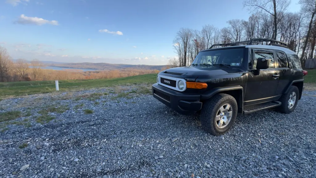 The black and white Adventure Adjacent FJ Cruiser overlooking Middle Creek State Park. One of many views as a trail guide.